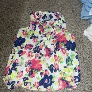 Its a Society Girl blouse, size XS, and is multicolored